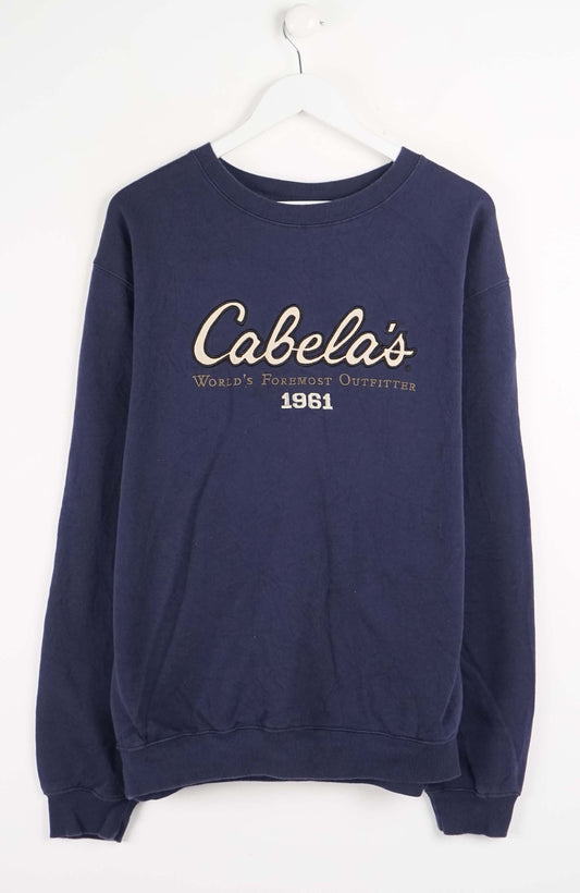 Navy blue sweatshirt with 'Cabela's' logo on a white background