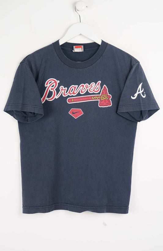 Navy blue t-shirt with Braves logo on a white hanger