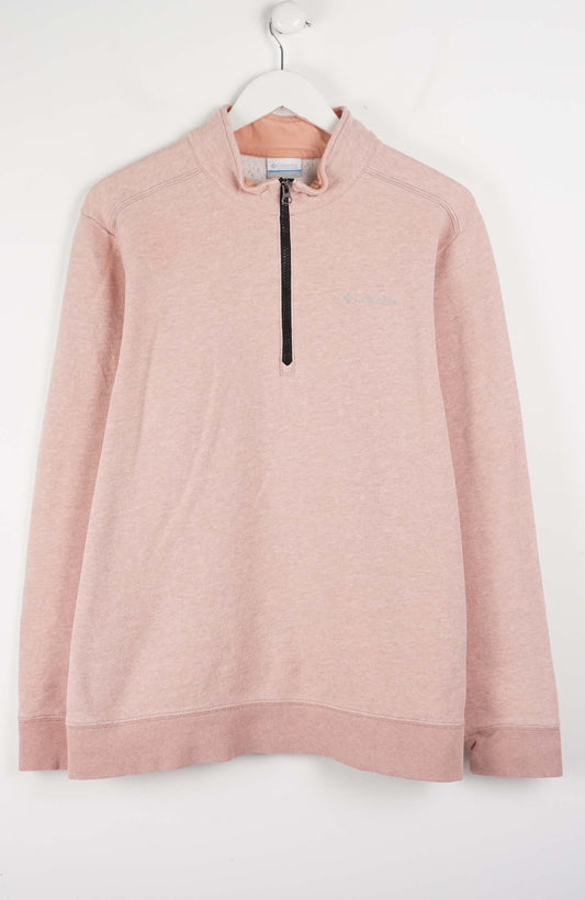 Pink sweatshirt with a black zipper on a white hanger against a white background
