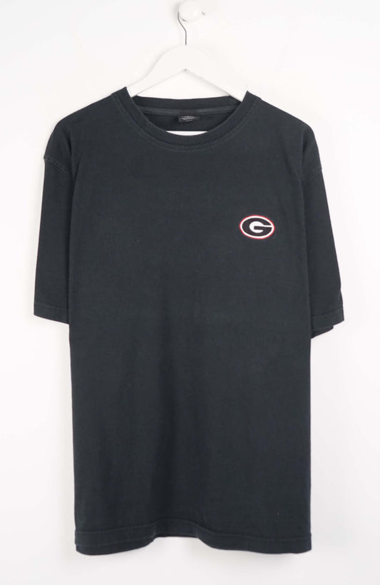 Black t-shirt with a small logo on a white background
