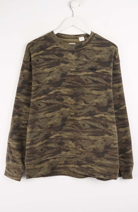 Camouflage-patterned sweatshirt on a white hanger against a white background