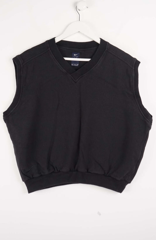 Black sleeveless sweater vest on a white hanger against a white background